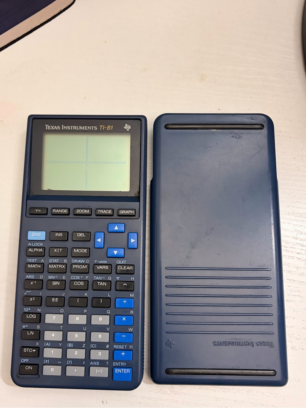 Texas Instruments TI-81 Graphing Calculator in dark blue